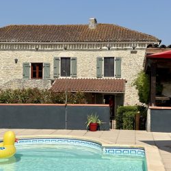 new poolside view of house